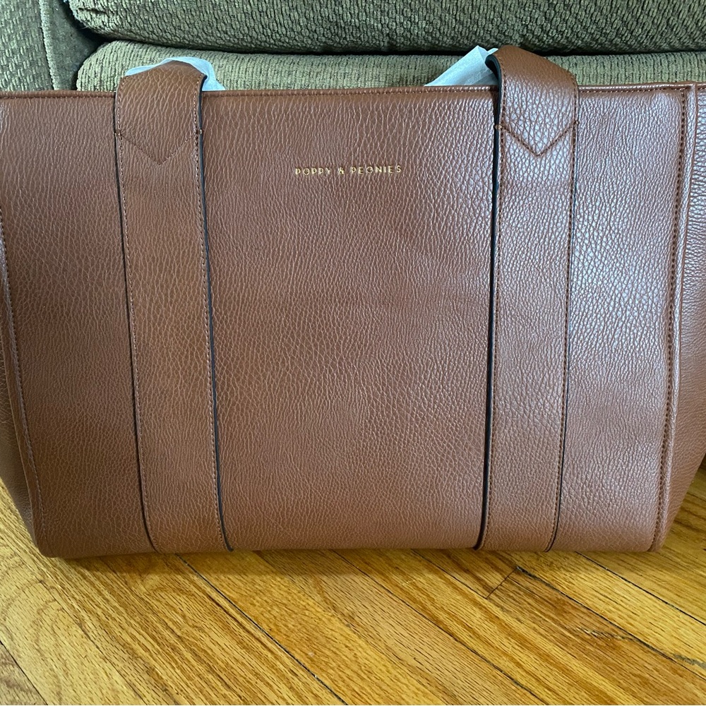 Poppy & Peonies Multitasker Bag chestnut 
NWT and dust bag